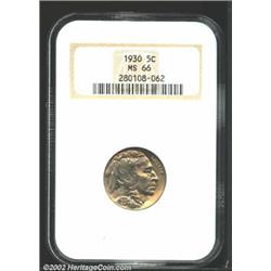 1930 5C MS66 NGC. Brilliant lustrous surfaces with a subtle golden undertone. A couple of trivial ma