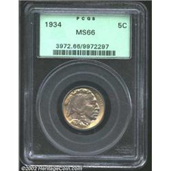 1934 5C MS66 PCGS. Beautifully toned in shades of lilac, orange, and green-gray. The strike is certa
