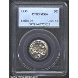 1935 5C MS66 PCGS. Icy patina with very slight golden hues near the obverse devices. A couple of sma