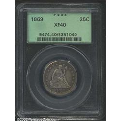 1869 25C XF40 PCGS. Evenly worn with mottled gray and russet toning. A very scarce issue with an ori