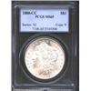 Image 1 : 1880-CC S$1 MS65 PCGS. Brilliant and lustrous with nearly pristine fields. There is a faint dash bel