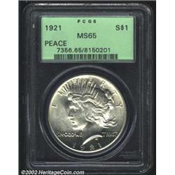 1921 S$1 MS65 PCGS. A lustrous and nicely struck Gem that has beautifully preserved surfaces. There.