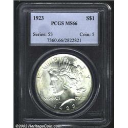 1923 S$1 MS66 PCGS. Brilliant white with full, blazing mint bloom. The strike is essentially full an