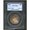 1884 50C PR66 PCGS. This is an interesting example from the standpoint of toning. The majority of th