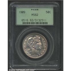 1909 50C MS62 PCGS. This is a remarkably appealing coin despite a somewhat subdued appearance. There