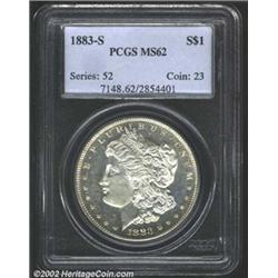 1883-S S$1 MS62 PCGS. A well struck and mildly prooflike representative that has wisps of apricot pa
