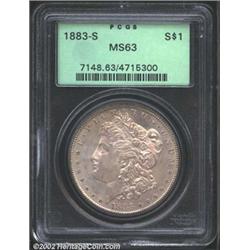1883-S S$1 MS63 PCGS. Well struck and lustrous with deep silver-gray patina. The fields are immacula