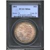 Image 1 : 1884 S$1 MS66 PCGS. The golden-brown and rose-violet patina is gorgeous. Lustrous and well struck wi