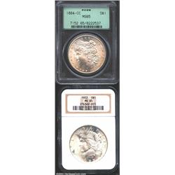 1884-CC S$1 MS65 PCGS, the surfaces are gorgeous; and a 1922 MS65 NGC, a minor reeding mark in the t