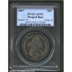 1807 50C Draped Bust AU53 PCGS. O-105, R.2. Deep gray and blue toning covers most of each side with.