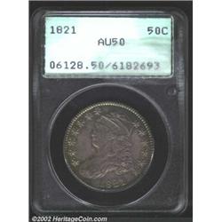 1821 50C AU50 PCGS. O-104, R.1. Deeply toned and problem-free with strong peripheral details. Import