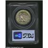 Image 2 : 1920 50C MS65 PCGS. The obverse has rich apricot patina, while the reverse has lavender and yellow-g
