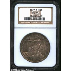 1877-S T$1 MS65 NGC. The rich peripheral apricot-gold patina cedes to silver-gray centers. Stars 7 t