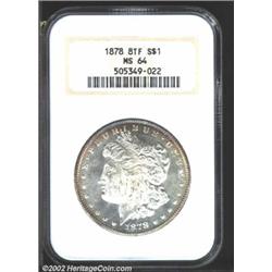 1878 8TF S$1 MS64 NGC. Nearly full-white with a bit of cobalt-blue obverse peripheral toning. The su