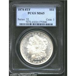 1878 8TF S$1 MS65 PCGS. Satiny white surfaces with noticeable reflectivity in the fields. The strike