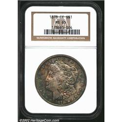 1878-CC S$1 MS65 NGC. Outrageously toned with deep cobalt-blue, gold, gray, and russet patina. A lus