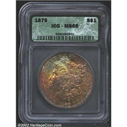 1879 S$1 MS65 ICG. The obverse has speckled rose-violet, gold, and powder-blue patina, while the rev