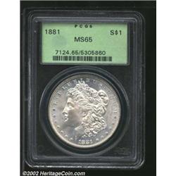 1881 S$1 MS65 PCGS. A flashy and mildly prooflike Gem with a razor-sharp strike and a clean cheek. A