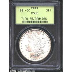 1881-CC S$1 MS65 PCGS. Well struck and lustrous with just a trace of apricot patina. The surfaces ar