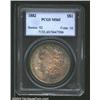 Image 1 : 1882 S$1 MS65 PCGS. A lustrous Gem that has splendid sea-green and copper-gold patina. Well struck a