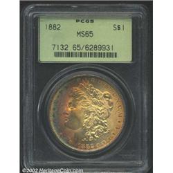 1882 S$1 MS65 PCGS. An exceptionally attractive example, made so not only by the clean, problem-free