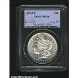 1882-CC S$1 MS66 PCGS. Lightly toned with wisps of apricot color. A lustrous and sharply struck Gem.