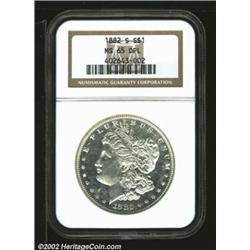 1882-S S$1 MS65 Deep Mirror Prooflike NGC. The 18 in the date is very lightly recut. A well struck a