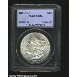 1883-CC S$1 MS66 PCGS. A lustrous Gem with immaculate surfaces and wispy tan patina. The hair above.