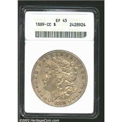 1889-CC S$1 XF45 ANACS. Luminous tan-gold patina. Luster glimmers from the legends and devices. The.
