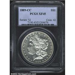 1889-CC S$1 XF45 PCGS. This untoned example displays moderately glowing fields and devices that are.