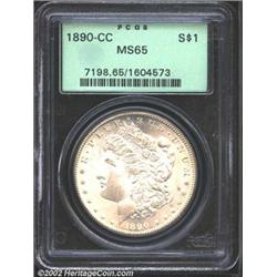 1890-CC S$1 MS65 PCGS. The first in a trio of conditionally challenging CC-mint Morgans from the ear