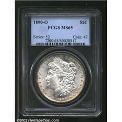 1890-O S$1 MS65 PCGS. Light peripheral copper-gold patina. A lustrous Gem with an immaculate reverse