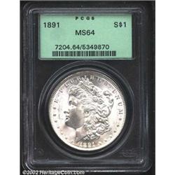 1891 S$1 MS64 PCGS. A brilliant, well struck, and lustrous near-Gem. The surfaces are remarkably pre