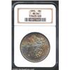 Image 1 : 1896 S$1 MS66 NGC. Lustrous surfaces uniformly bathed in iridescent, rainbow toning. The toning is r
