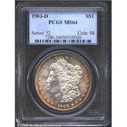 1903-O S$1 MS64 PCGS. The orange-brown patina at the borders is especially rich on the obverse. A we