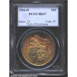 1904-O S$1 MS67 PCGS. An exceptionally smooth and attractive survivor of this otherwise common 20th.