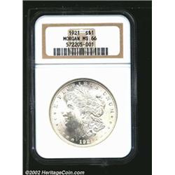 1921 S$1 MS66 NGC. A lustrous Gem with a good strike and relentlessly clean surfaces. A pleasing rep