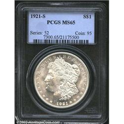 1921-S S$1 MS65 PCGS. Frosty white, with an almost complete lack of color and only a few extremely m