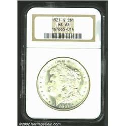 1921-S S$1 MS65 NGC. Brilliant, snow white surfaces with excellent luster. There are a few luster gr