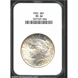 1924 S$1 MS66 NGC. Lustrous, satiny white surfaces with some russet toning by the peripheries. Aside