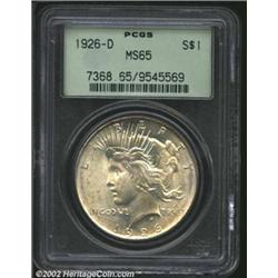 1926-D S$1 MS65 PCGS. Both sides have traces of lemon patina. Well struck in the centers, with only.