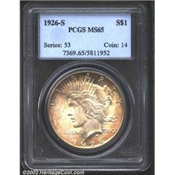 1926-S S$1 MS65 PCGS. Golden toning deepening to russet around the obverse peripheries. The strike i