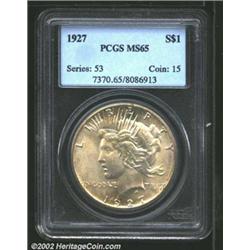 1927 S$1 MS65 PCGS. Lustrous, bright white surfaces with a few scattered light marks, primarily in t