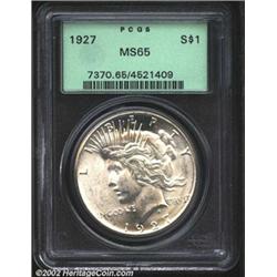 1927 S$1 MS65 PCGS. Bright and fully struck without a trace of color on either side. The mint luster
