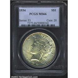 1934 S$1 MS66 PCGS. Golden toning covers each side of this lovely piece with a faint outline of irid