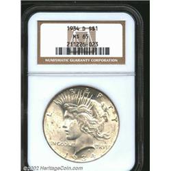 1934-D S$1 MS65 NGC. A well struck and lustrous Gem that has a hint of gold patina. The eagle's head