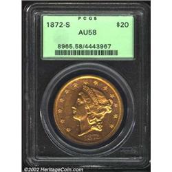 1872-S $20 AU58 PCGS. A rather prooflike example that has essentially complete mint luster, but has.