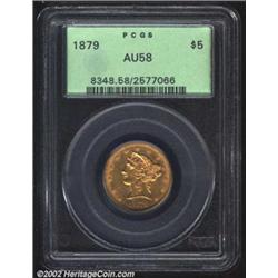 1879 $5 AU58 PCGS. Virtually complete luster with a light coating of coppery patina that effective o