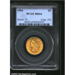 1904 $5 MS64 PCGS. A sharply struck and lustrous near-Gem that has splendid honey-gold color. Exquis