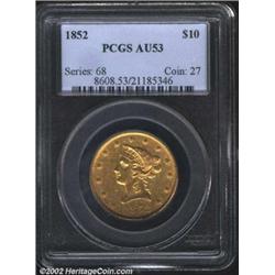 1852 $10 AU53 PCGS. Yellow-gold surfaces with some luster. Scattered contact marks and minor abrasio